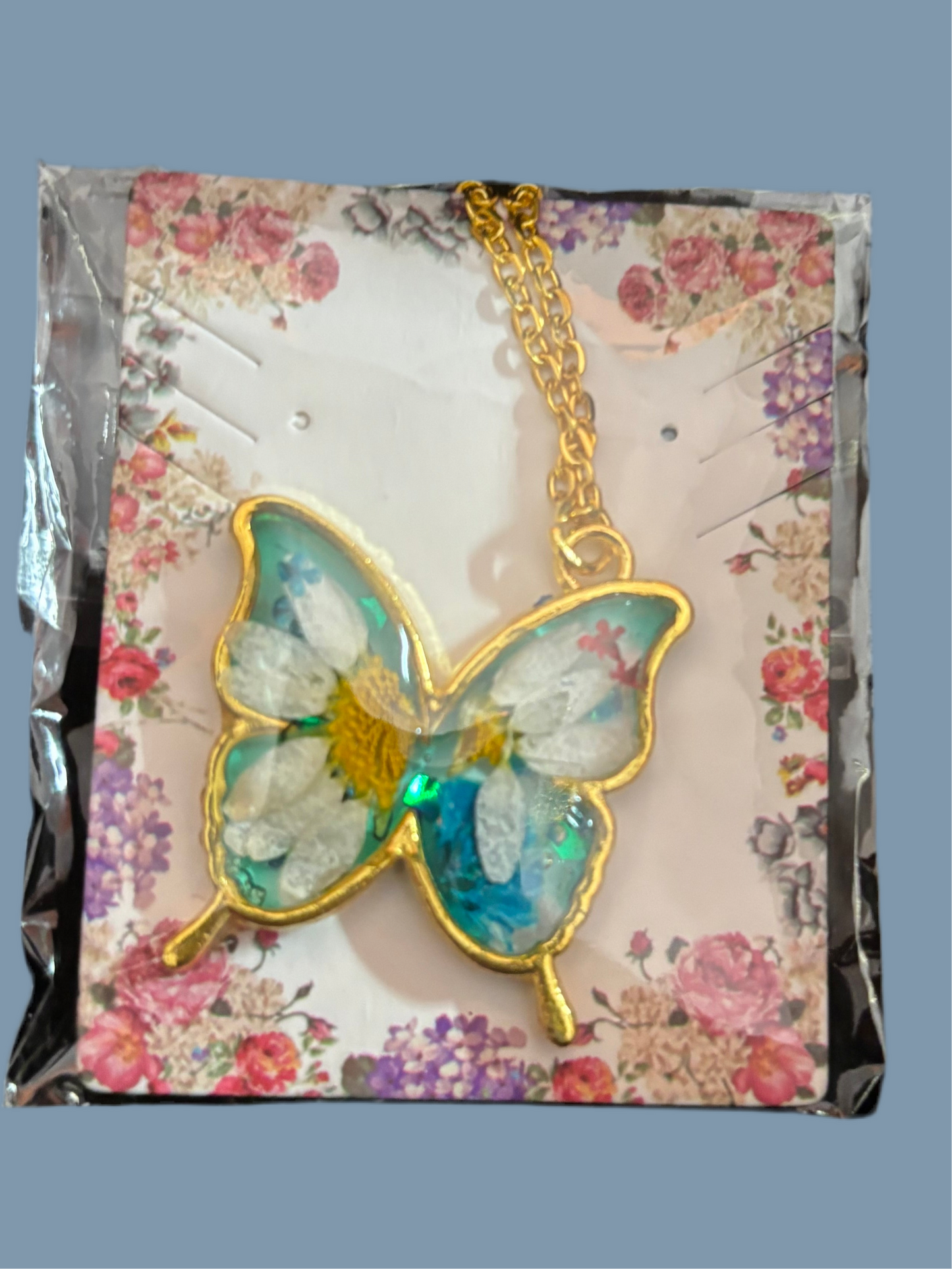 Resin butterfly necklace many flower colors available